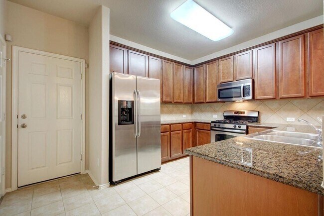 Building Photo - 1310 W Parmer Ln