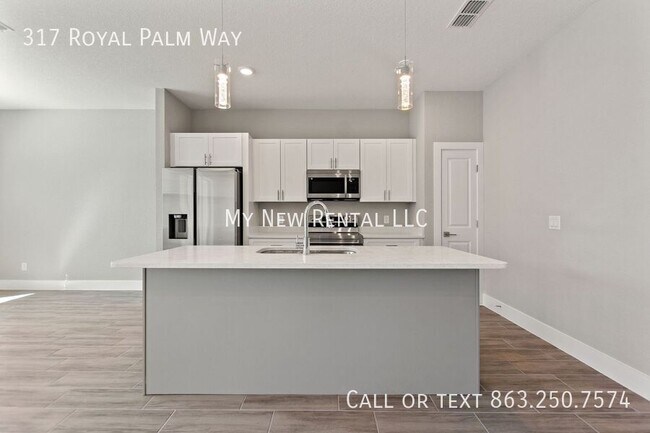 Building Photo - 317 Royal Palm Wy