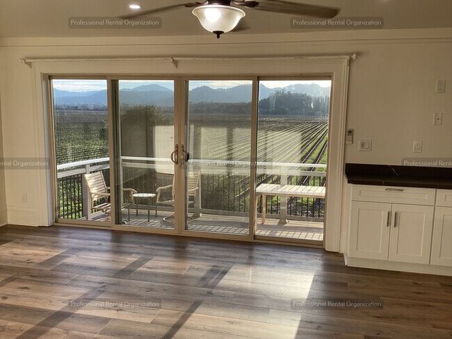 Building Photo - A price and views that can't be beat- Upper Flat with deck & expansive Vineyard and Sunset views