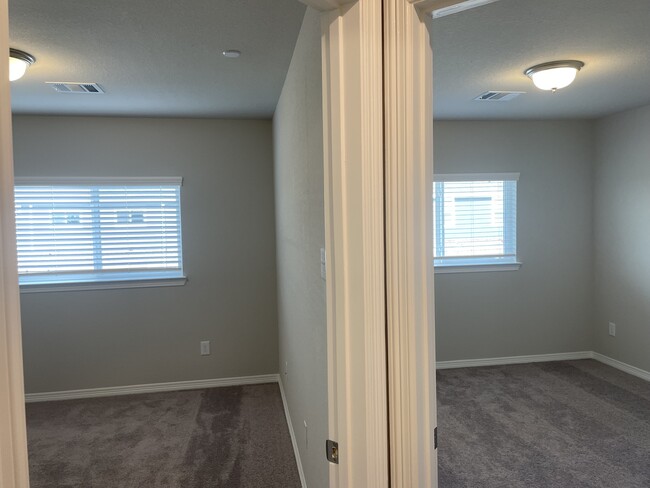 View of 2 bedrooms - 8036 Scanlan Trl