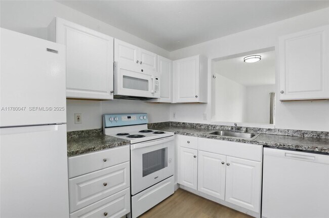 Building Photo - 8540 N Sherman Cir