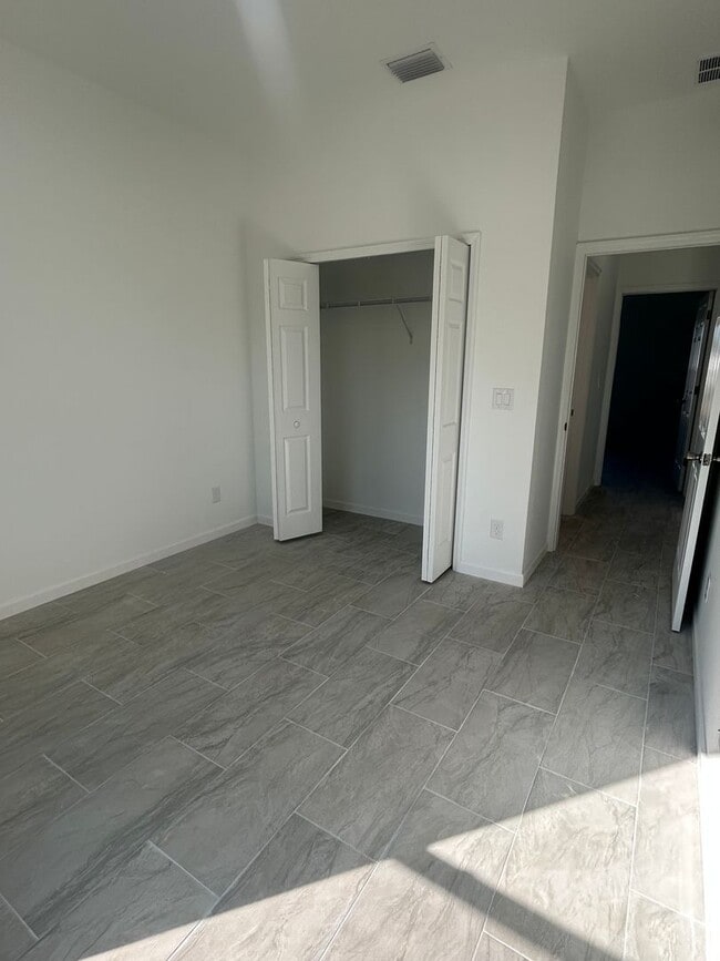 Building Photo - BRAND NEW CONSTRUCTION- 4 Bedroom 2 Bath-2 Car Garage-Serene Lake Placid Location