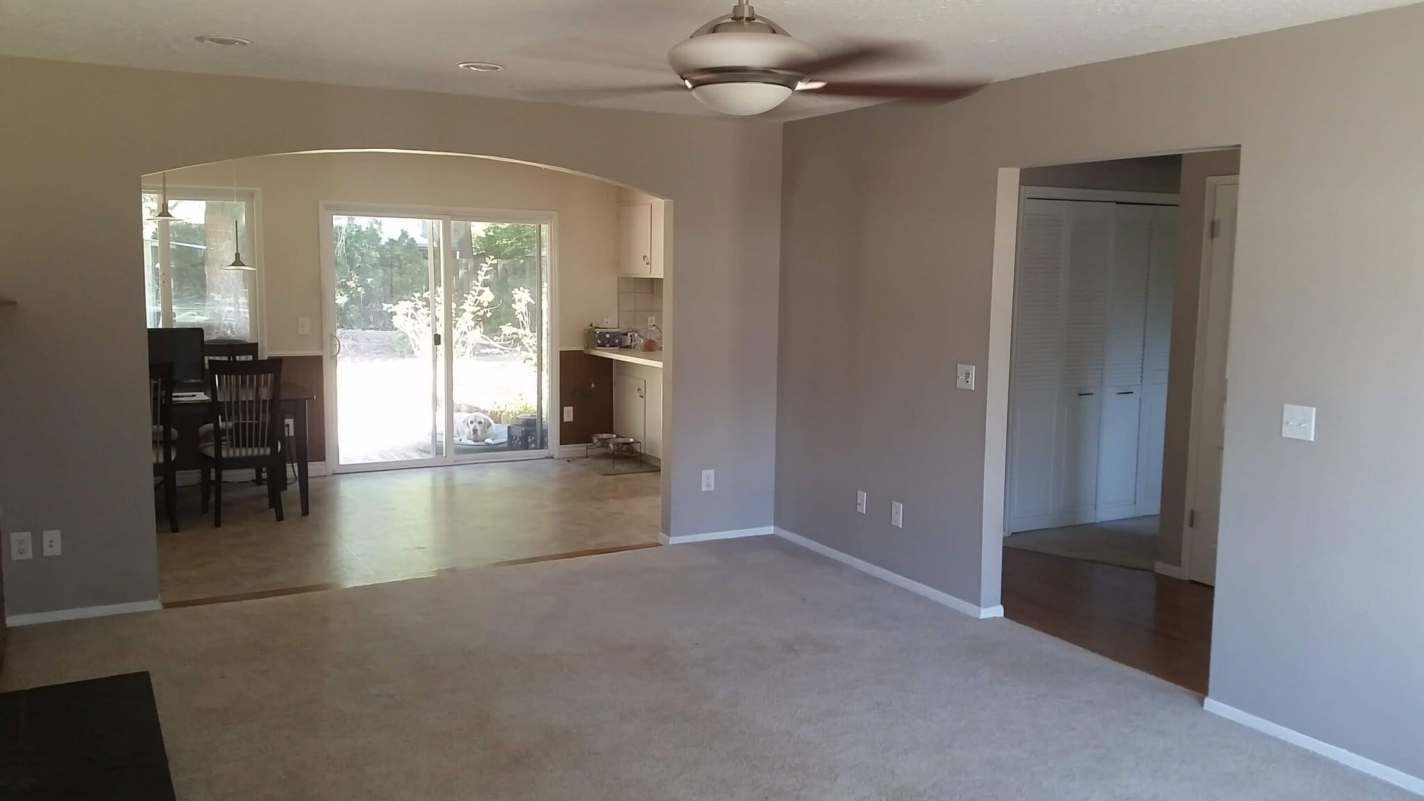 Dining room and kitchen viewed from living room. - 4061 NE Brogden St