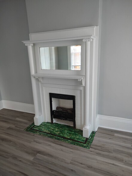 Original Fireplace. Rookwood pottery tile - 1024 Columbia St