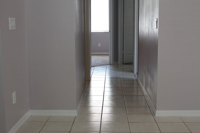 Building Photo - Freshly painted, four bedroom home available now!