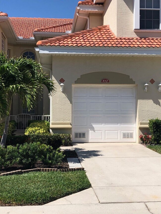 Building Photo - Experience Bell Tower Park. GATED ground floor 2 Bed 2 Bath Den 1 Car Garage Condo.