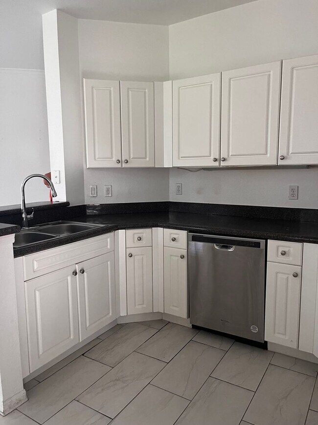 Building Photo - COMING SOON! Space, Style & Serenity! Enjoy comfortable living in this beautiful 4-bedroom home f...