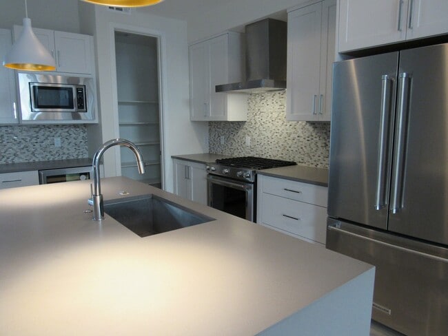 Building Photo - Town home a Block away from Sloan's Lake with roof top Deck