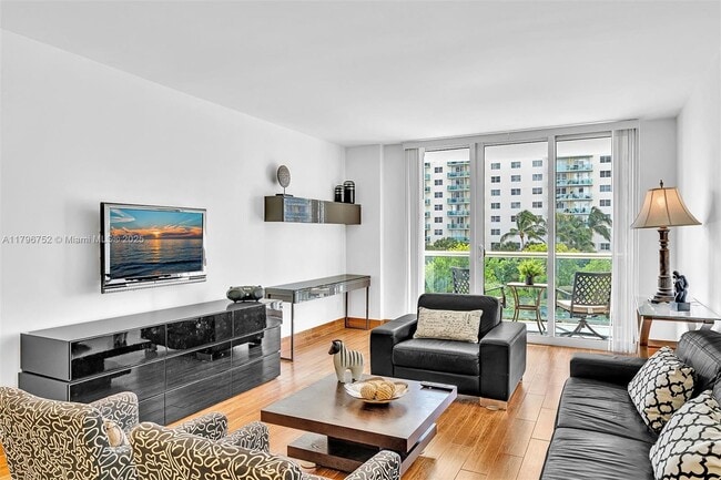 Building Photo - 19380 Collins Ave