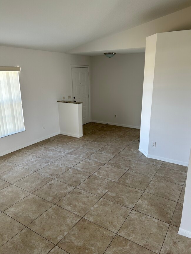 Building Photo - 6480 NW Volucia Dr