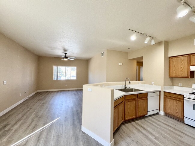 Building Photo - DOWNSTAIRS CONDO | GATED COMMUNITY | CENTENNIAL HILLS | UPDATED 3 BEDROOM