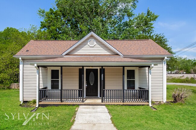 Primary Photo - The living is easy in this 2 bedroom, 1 ba...