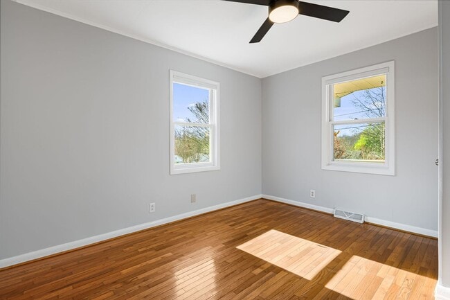 Building Photo - Modest East Asheville 3-Bedroom with Garage & Fenced-In Backyard