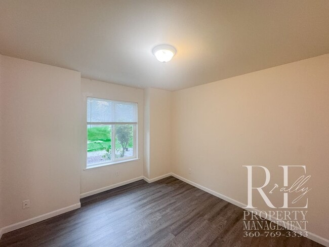 Building Photo - Duplex Living with Expansive Yard, LVP Flooring & Spacious Layout