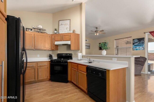 Building Photo - 8375 W Dahlia Dr