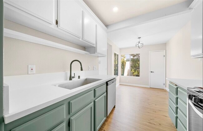 Kitchen looking to breakfast area - 20415 S Vermont Ave