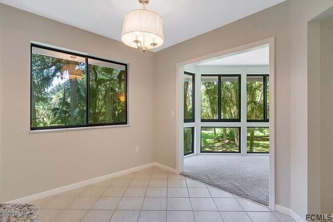 Building Photo - Stunning townhome on Palm Harbor Golf Course!