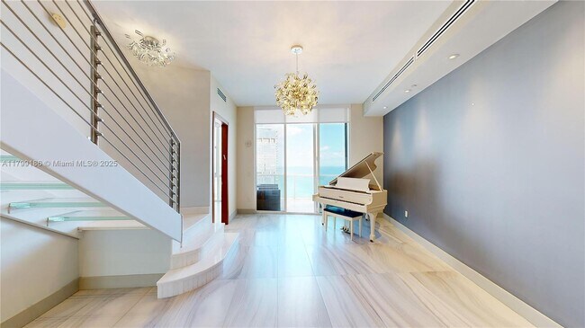 Building Photo - 18201 Collins Ave