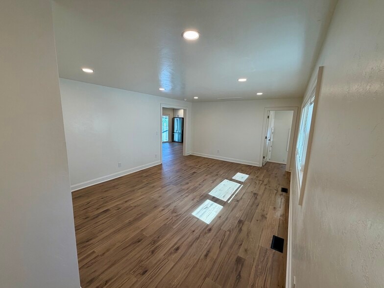 View of the living room from the front door. - 329 Ronald Dr