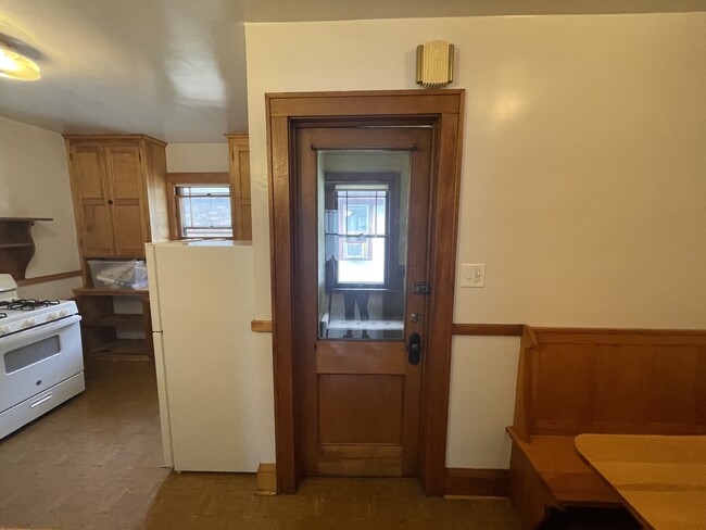 View from dining room entrance: sink is to the left. Breakfast nook to the right. - 4235 Pleasant Ave