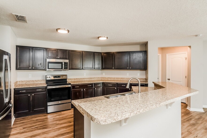 Building Photo - 7634 Tangle Rush Dr