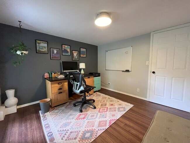 Building Photo - Spacious 4-Bedroom Home with Lush Landscap...