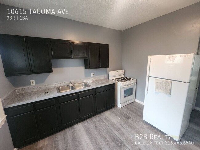 Building Photo - 10615 Tacoma Ave