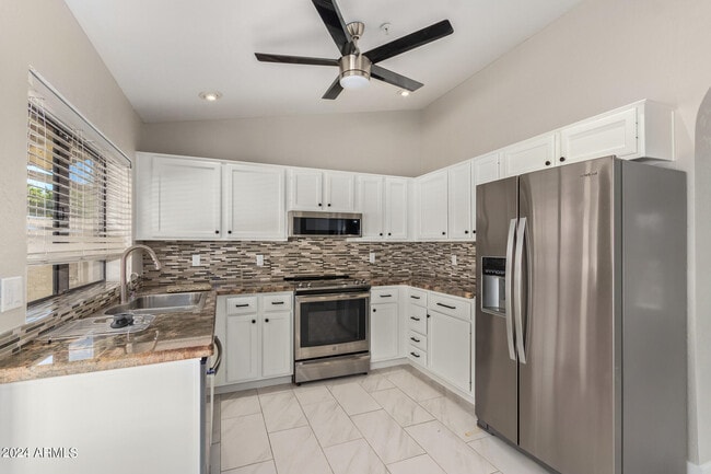 Building Photo - 9138 E Davenport Dr