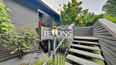 Building Photo - Top-floor 2-level condo with brand-new kitchen and ensuite bath – Utilities and internet included...