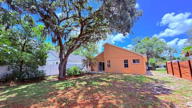 Building Photo - Bright 3/2 Home Near UCF with Vaulted Ceilings & Spacious Backyard!