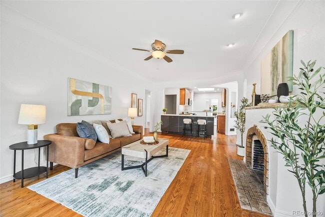 Building Photo - "Spacious 5-Bedroom Gem with Hardwood Floors & Cozy Fireplace in Denver's Heart!"