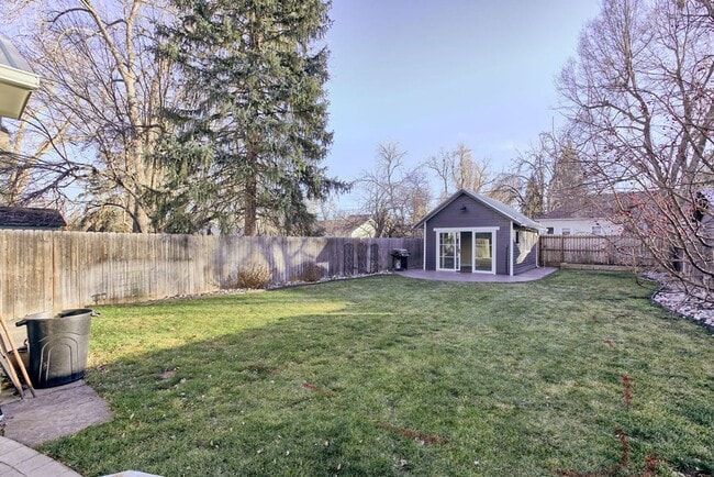 Building Photo - Exceptional 3 Bedroom Home with office & detached flex space