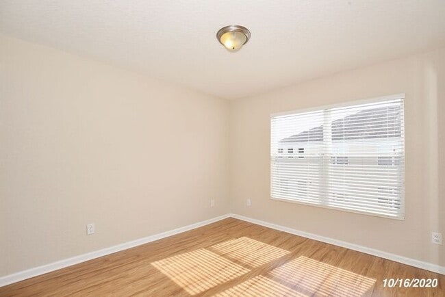 Building Photo - Beautiful 3/3.5 Townhome with a Spacious 2 Car Garage in the Gate Guarded Community of Spring Isl...