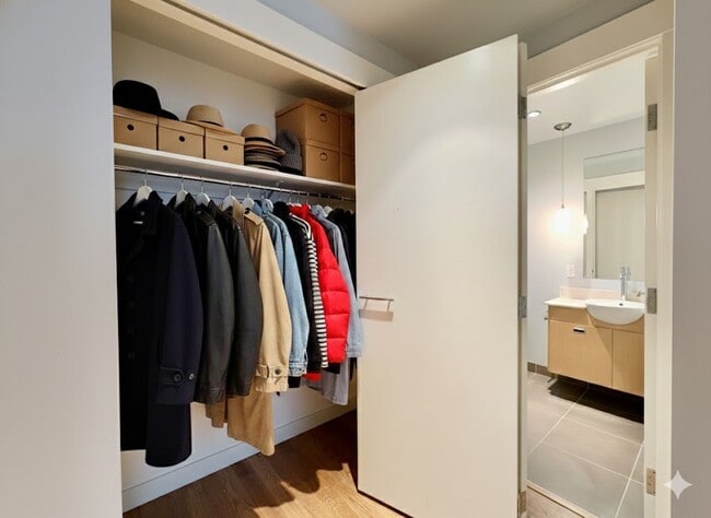 Building Photo - Exquisite Condominium at the Renowned Waterfront Pearl with Views of the River, Work Out Facility...