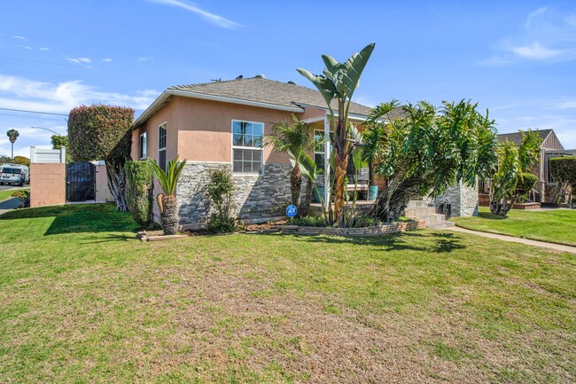 Building Photo - Stunning Remodeled Corner-Lot Home – An En...