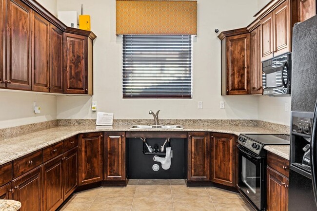 Building Photo - Bella Terrazza FURNISHED CONDO  --  Golf C...