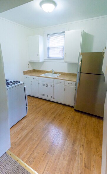 Sun rich kitchen with hardwood floors - 3 Cedar St