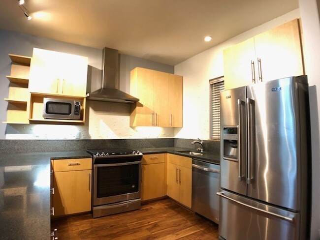 Building Photo - Fantastic SE 2 Bed 2.5 Bath + a Den Condo ...