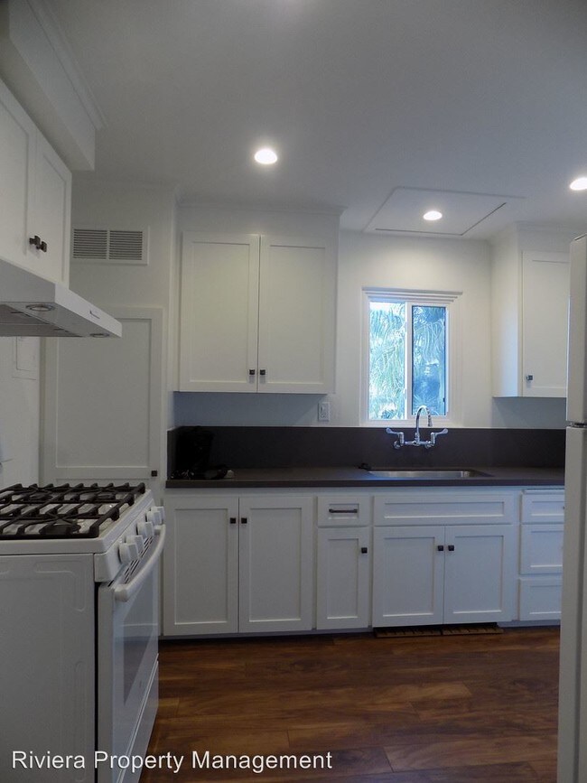 Building Photo - 6675-6677 Electric Ave