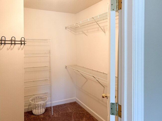 Building Photo - Fully Furnished 4-Bedroom Home with a Stocked Kitchen, Fenced Yard, and 2-Car Garage