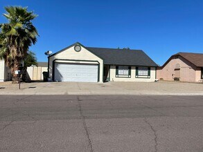 Building Photo - Charming 3 bed 2 bath single level home with RV Gate