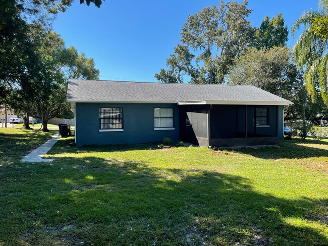 Building Photo - READY TO MOVE INTO 3/2/2 WITH IDEAL LOCATI...