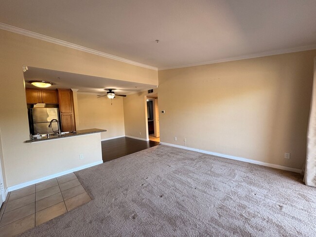Building Photo - 1BR Condo with Private Balcony, Central A/C & Community Amenities in Corona