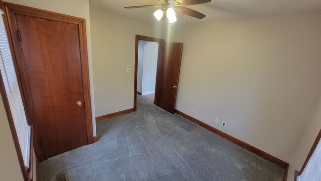 Building Photo - Two Bedroom Home with Fenced In Backyard