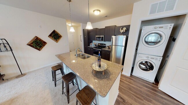 Building Photo - A3 | 1 Bed 1 Bath | 899 sf