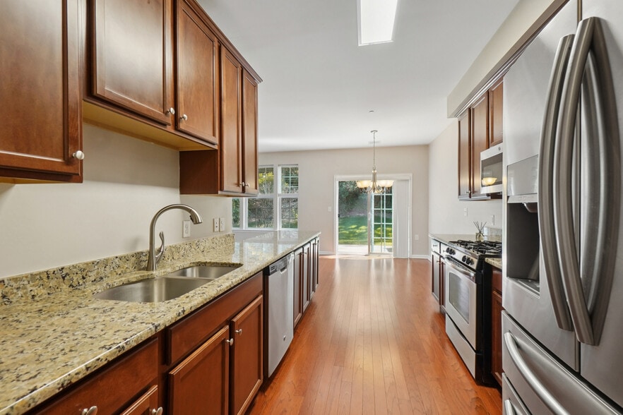 Kitchen to Dining and Patio - 401 Waterview Ct