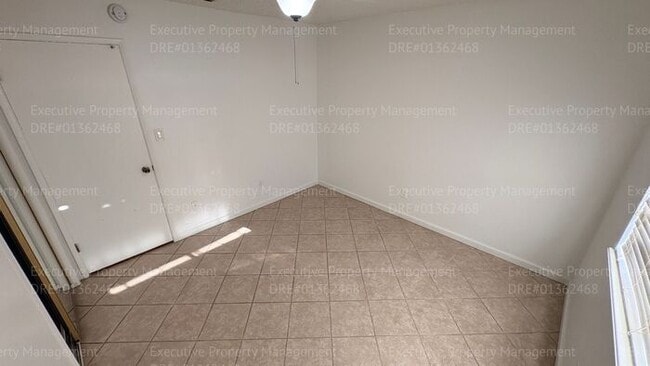 Building Photo - 3 bedroom 2 bathroom home on a corner lot with extra fenced parking.