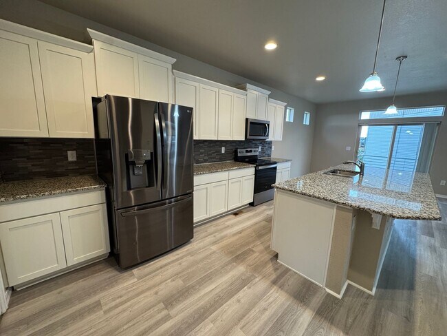 Building Photo - Modern 3-Story Corner Lot Home with Hot Tu...