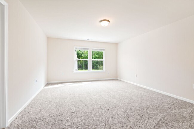 Building Photo - Like-New Townhome Walk to Downtown | Garage + Internet Included