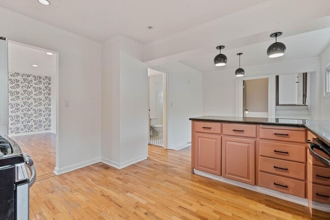 Building Photo - Beautiful, modern 4-bdrm/2-bath home in Concordia—Private, urban sanctuary w/ flex spaces